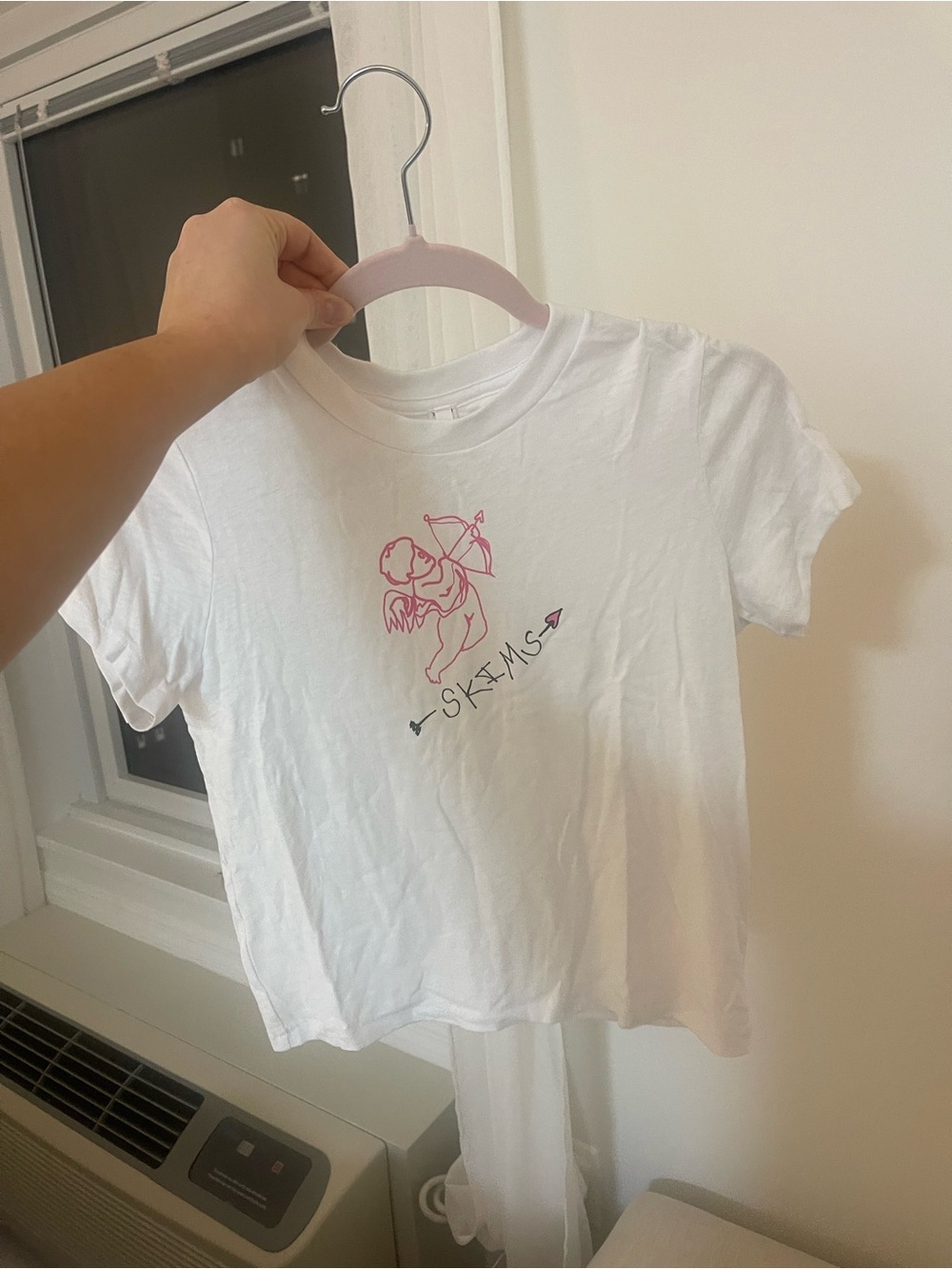 SKIMS White Short-Sleeve Tee with Pink Cupid Graphic